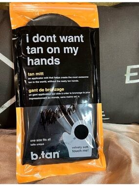 Two b. tan Tan Mitt Applicators